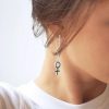 Women-Unite-long-earrings-1_590x