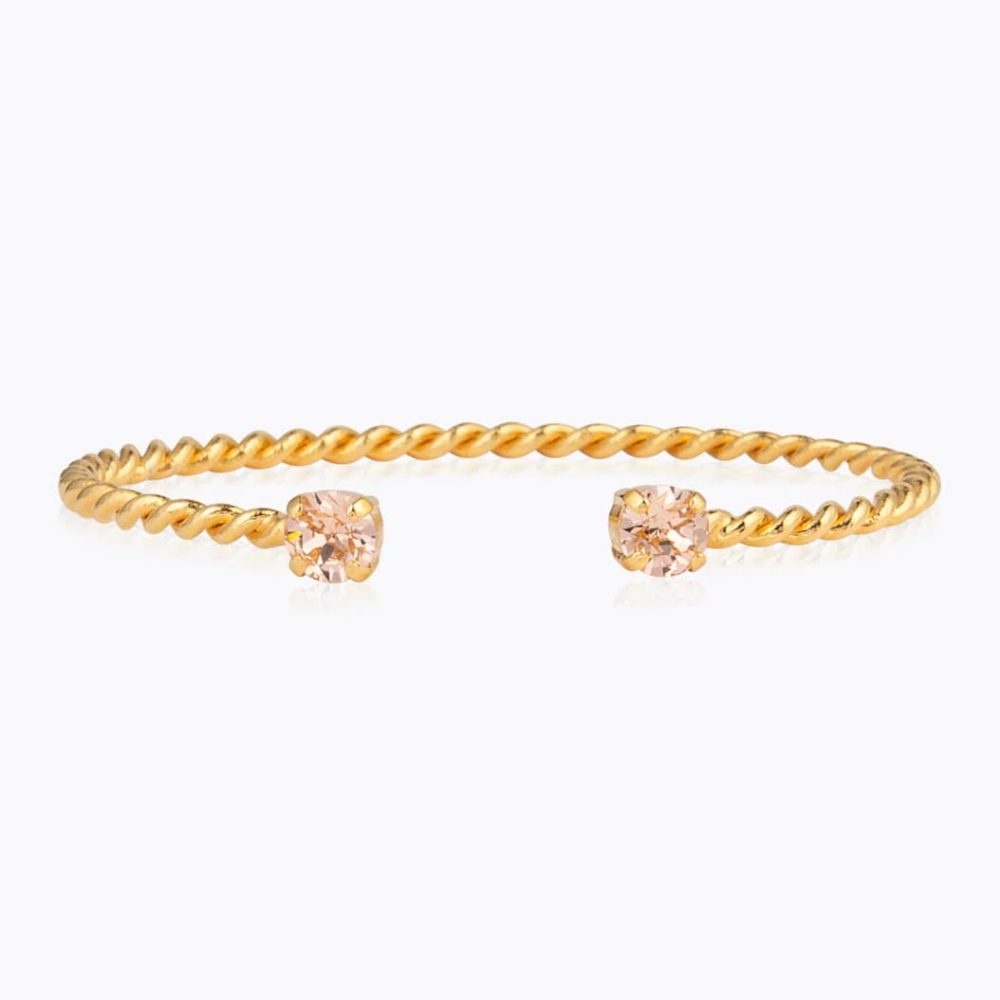 1191-mini-twist-bracelet-light-peach-Caroline-Svedbom-1054x1054-iTRADEPHOTO