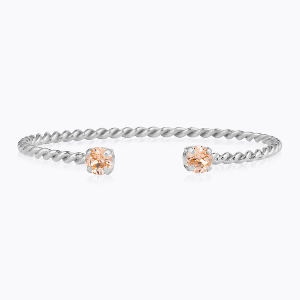 1192-mini-twist-bracelet-light-peach-Caroline-Svedbom-1054x1054-iTRADEPHOTO