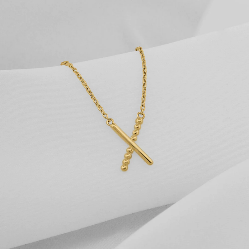 By Sofia Wistam Criss Cross Guldhalsband
